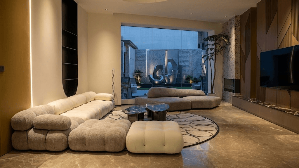 Modern luxury living room interior with modular sofa and TV wall