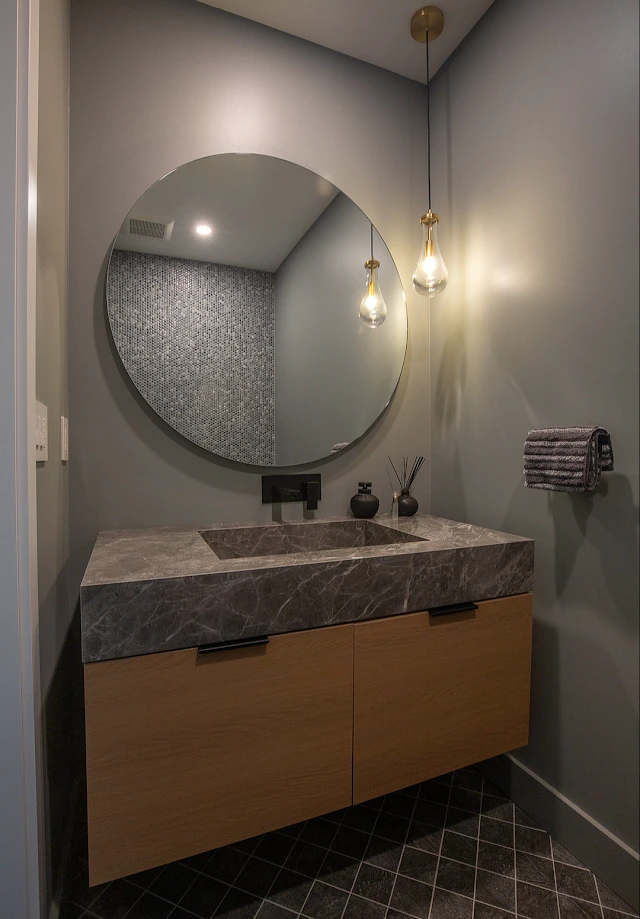 Bathroom Sink & Mirror of Modern Whole-Home Project in Canada